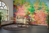 The room has natural light and simple, contemporary furniture.

