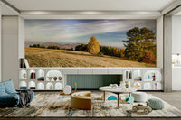 A realistic photo of an autumn meadow wall mural in a bright room.


