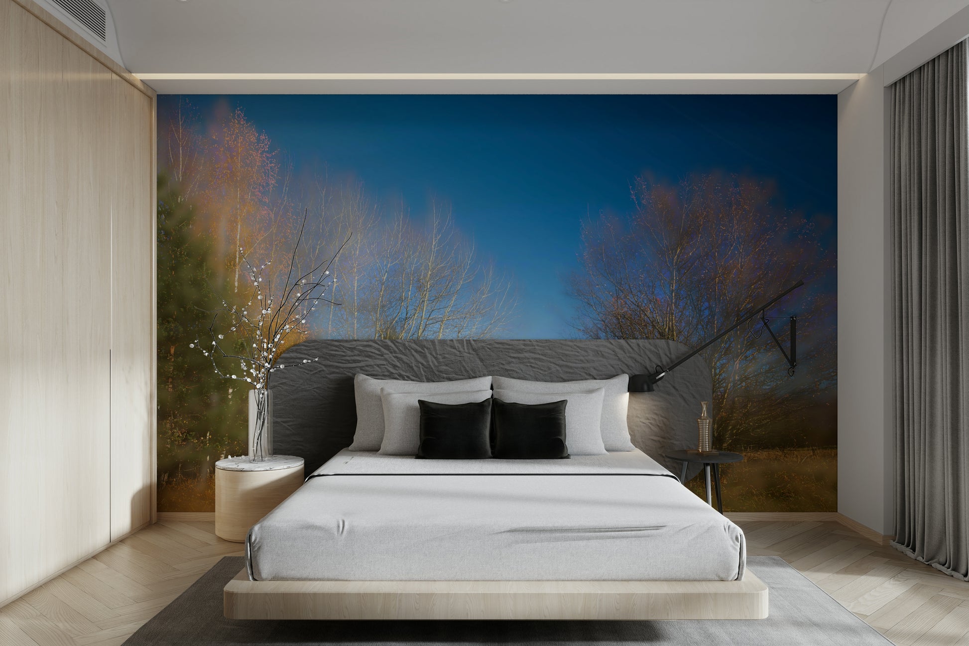 The mural shows a stand of trees with yellow and orange leaves.

