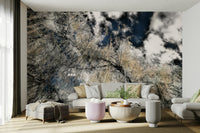 Silhouetted branches and sky mural
