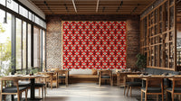 Stylized floral and leaf patterns in blue, navy, indigo, white, and dark red on a wall.

