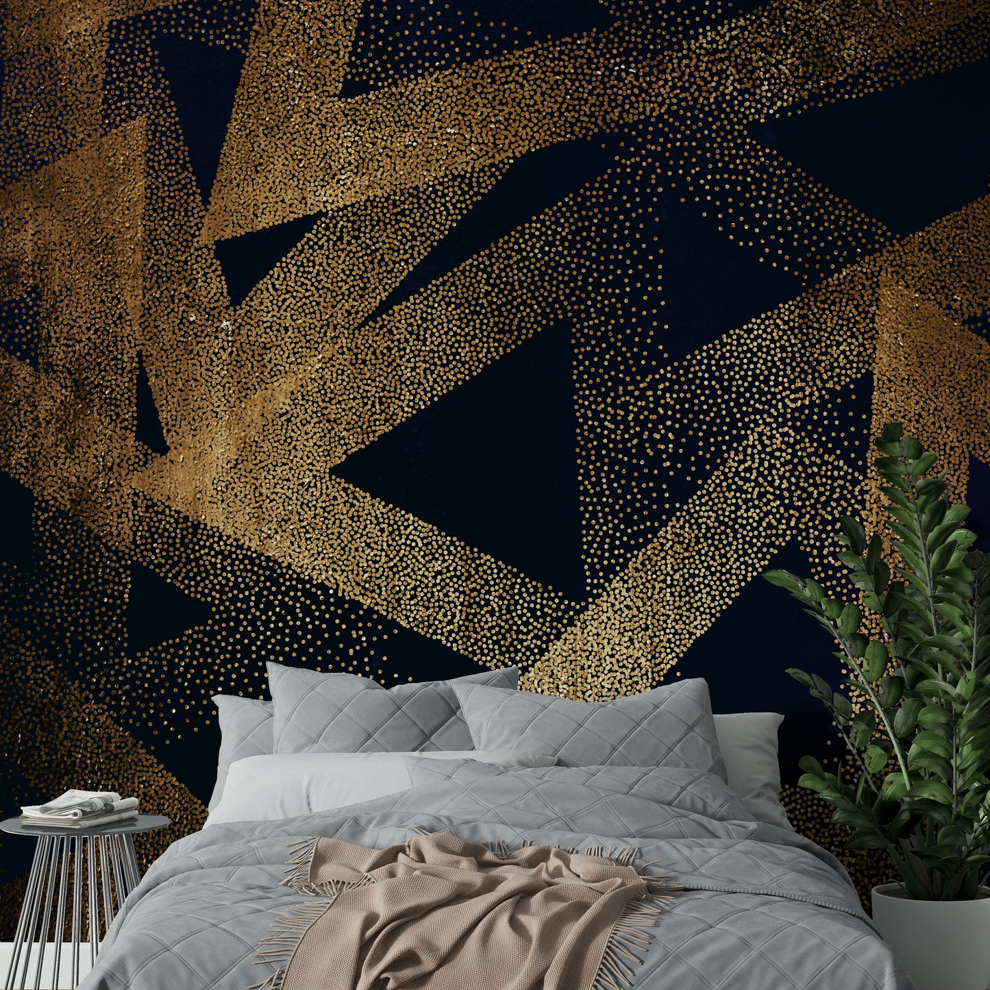 Silhouetted figures dancing in a wall mural.

