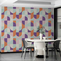 Interlocking geometric shapes in a wall mural.

