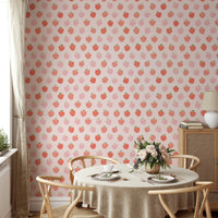 Whimsical strawberry pattern on a wall.


