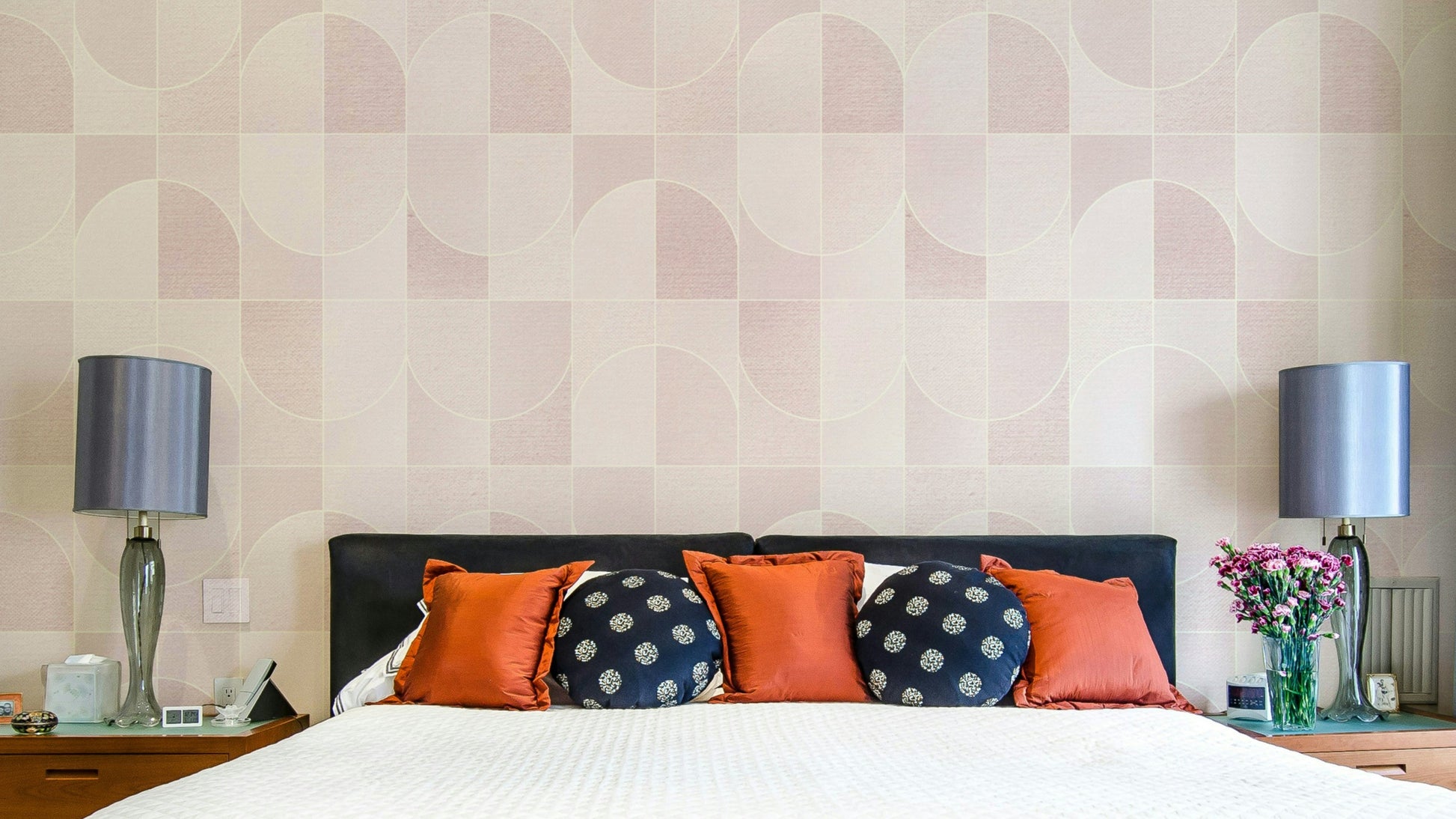 Blush pink geometric tile pattern.

