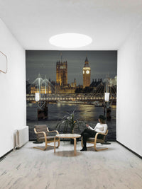 Illuminated bridge over the River Thames.

