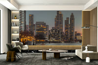 The mural covers a significant wall area, creating an immersive cityscape view.
