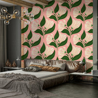 The background is a distinctive avocado pink.
