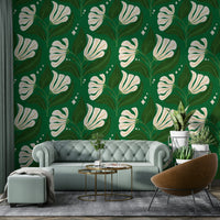 The background is a distinctive deep avocado green.
