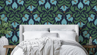 A dark and dramatic floral wallpaper pattern.
