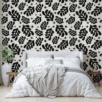 The colors are a modern palette of muted greens and grays.

