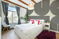 The design features elegant, layered arch shapes creating an illusion of depth.

