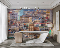 There are classic cars on the street.

