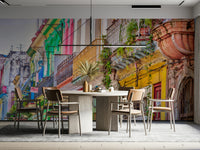 A wall mural of a vibrant Cuban street scene.

