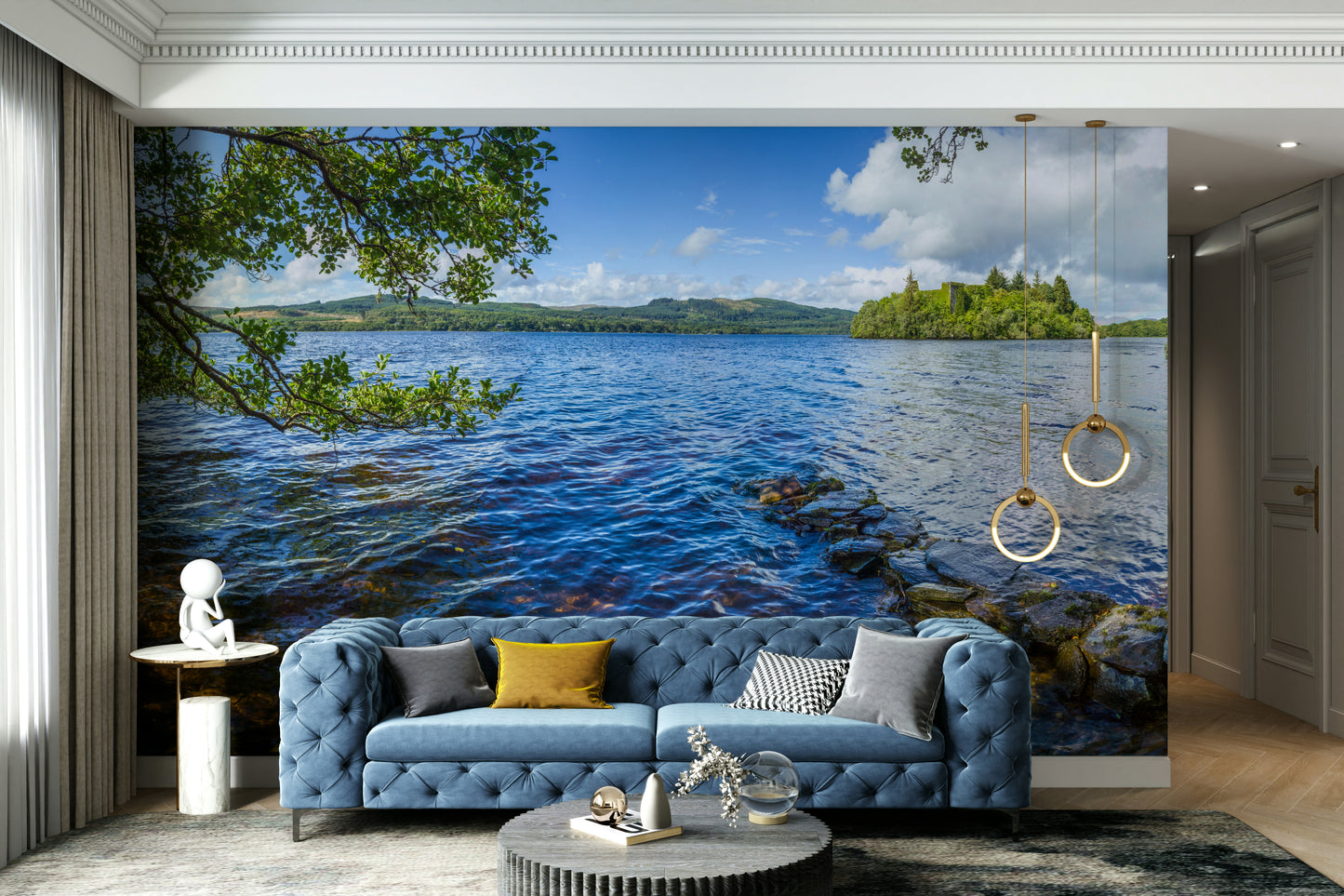 A wall mural of a loch and mountains.

