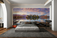 The surrounding trees and mountains are reflected in the water.

