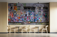 A wall mural with a graffiti pattern.

