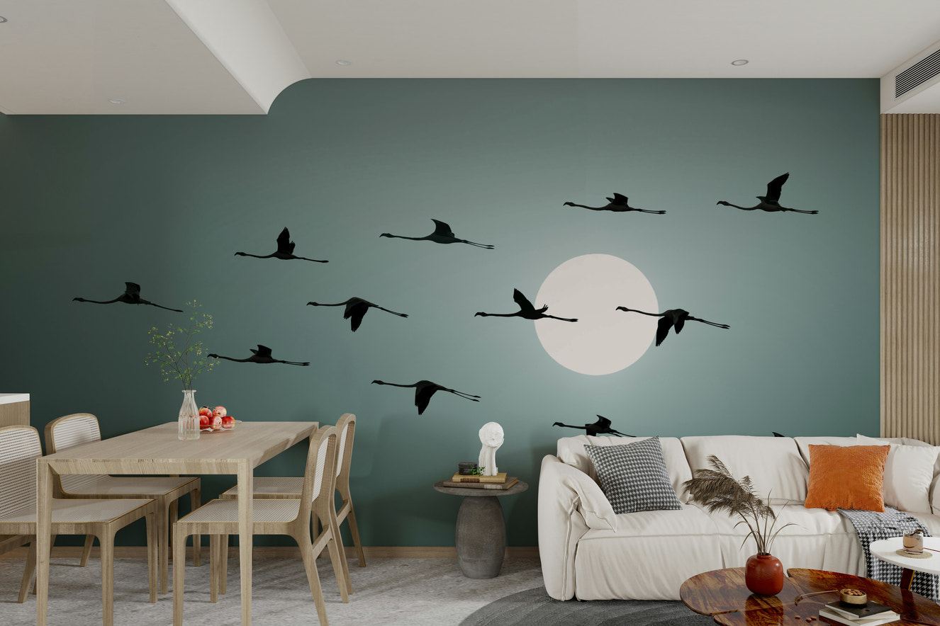 The image shows a flock of flamingo silhouettes.

