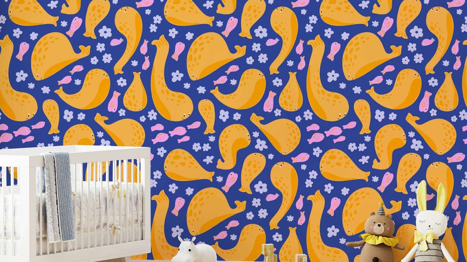 The image shows a pattern of playful sea creatures.

