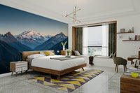 The mountains and moon are a central focus of the image.

