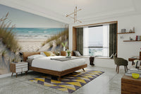 A wall mural of a peaceful coastal dune landscape.

