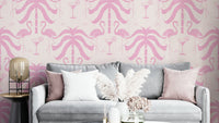 A wall mural of a tropical palm and flamingo pattern.

