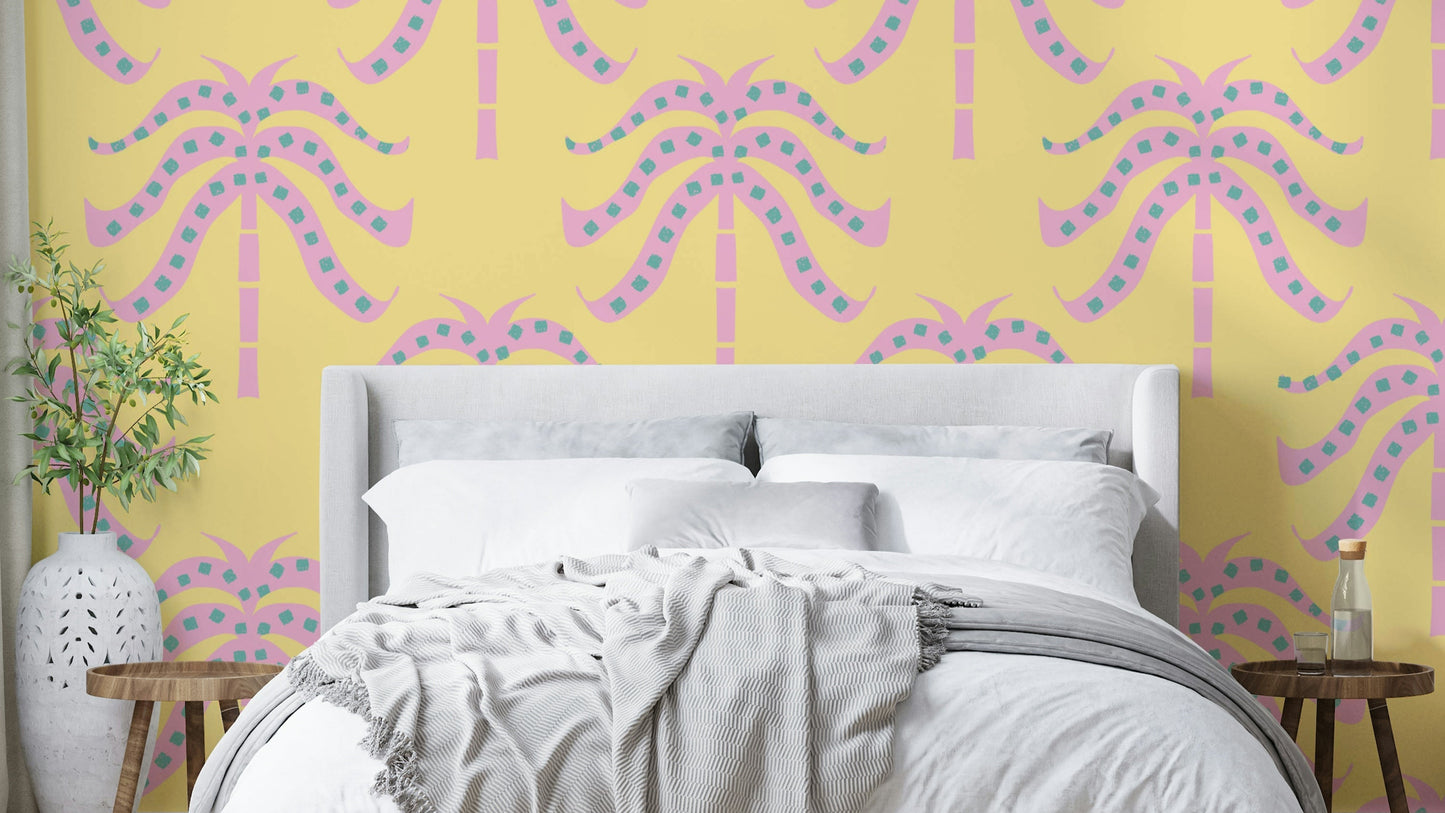 A wall mural of a tropical palm leaf pattern.

