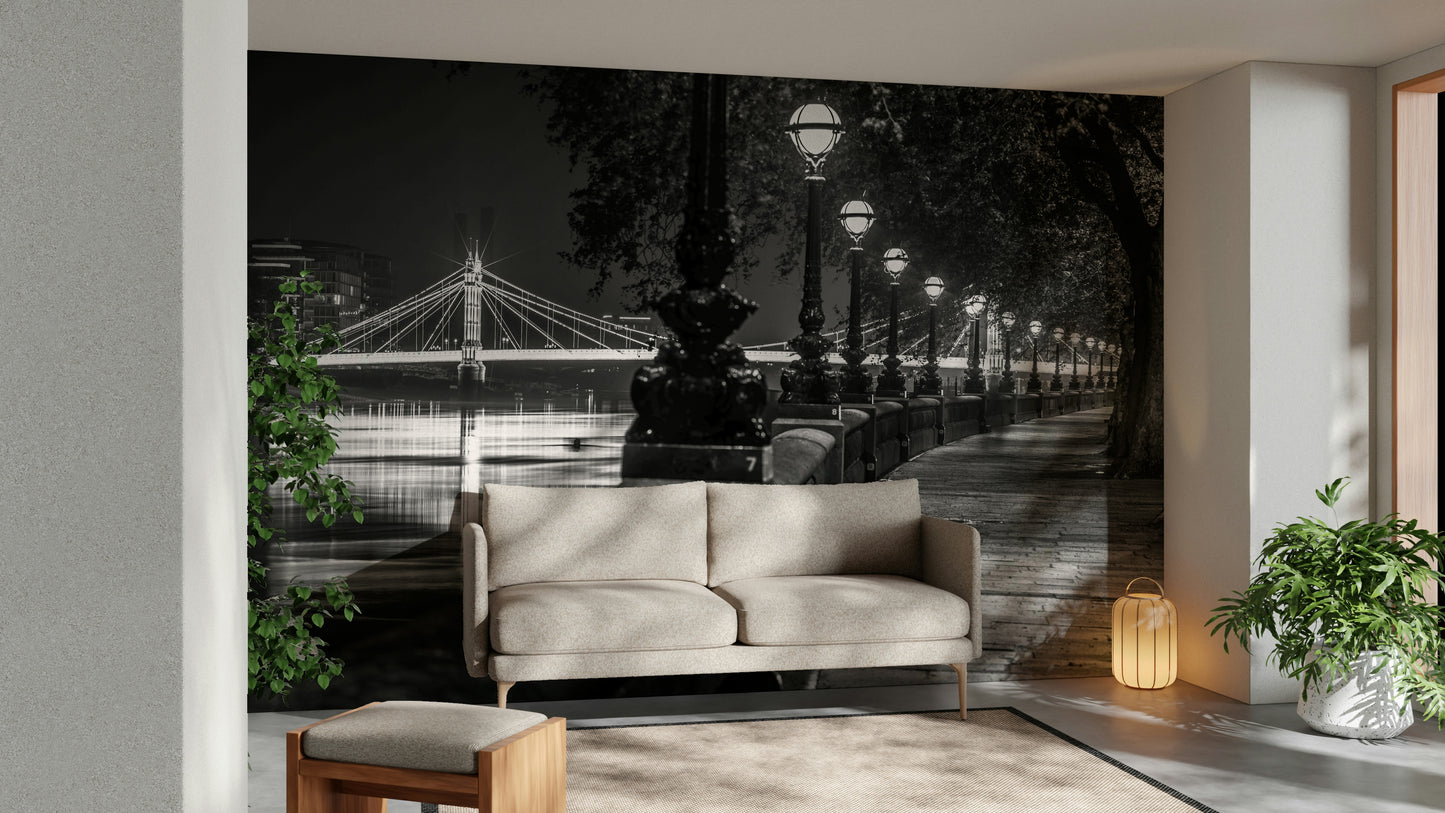 A black and white wall mural featuring a London scene.

