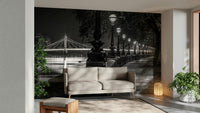 A black and white wall mural featuring a London scene.

