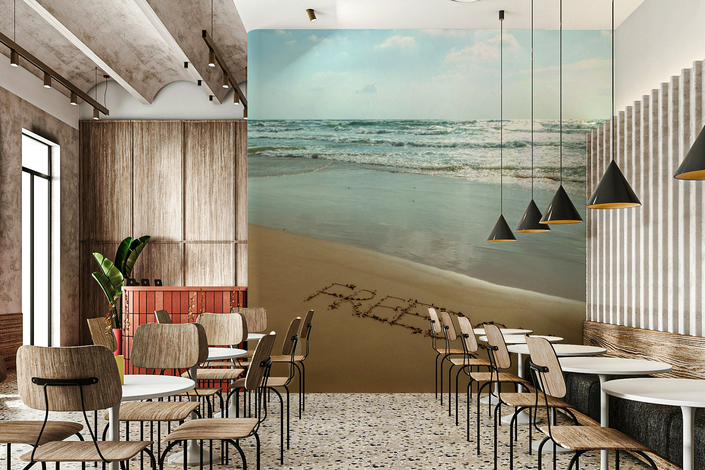 A close-up view shows the fine details of the sand and water.

