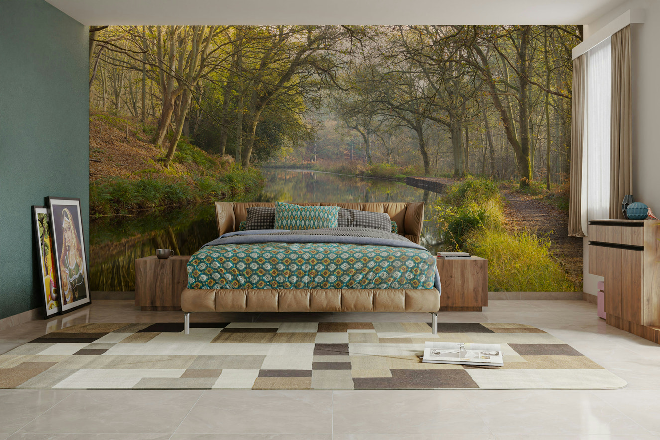 A wall mural featuring a peaceful forest scene.

