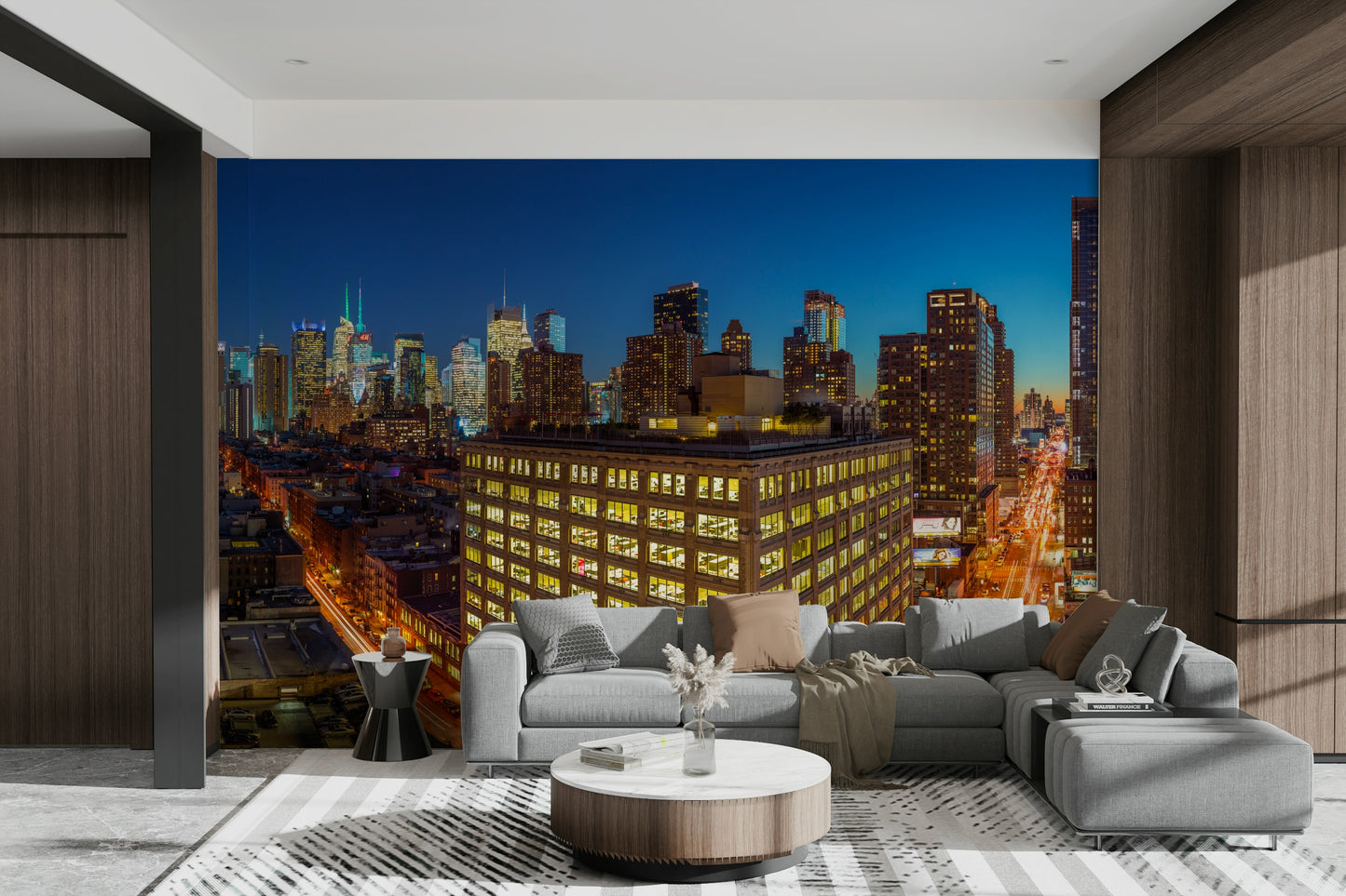 The image shows a full wall with glowing buildings and city lights.

