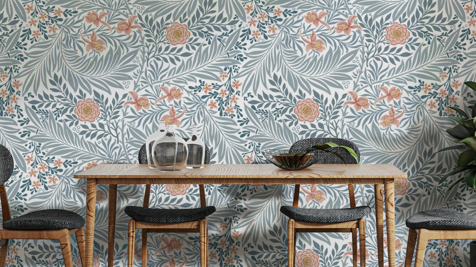 A wallpaper featuring a classic, intricate floral pattern.

