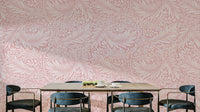 A wallpaper featuring a classic, intricate floral pattern.

