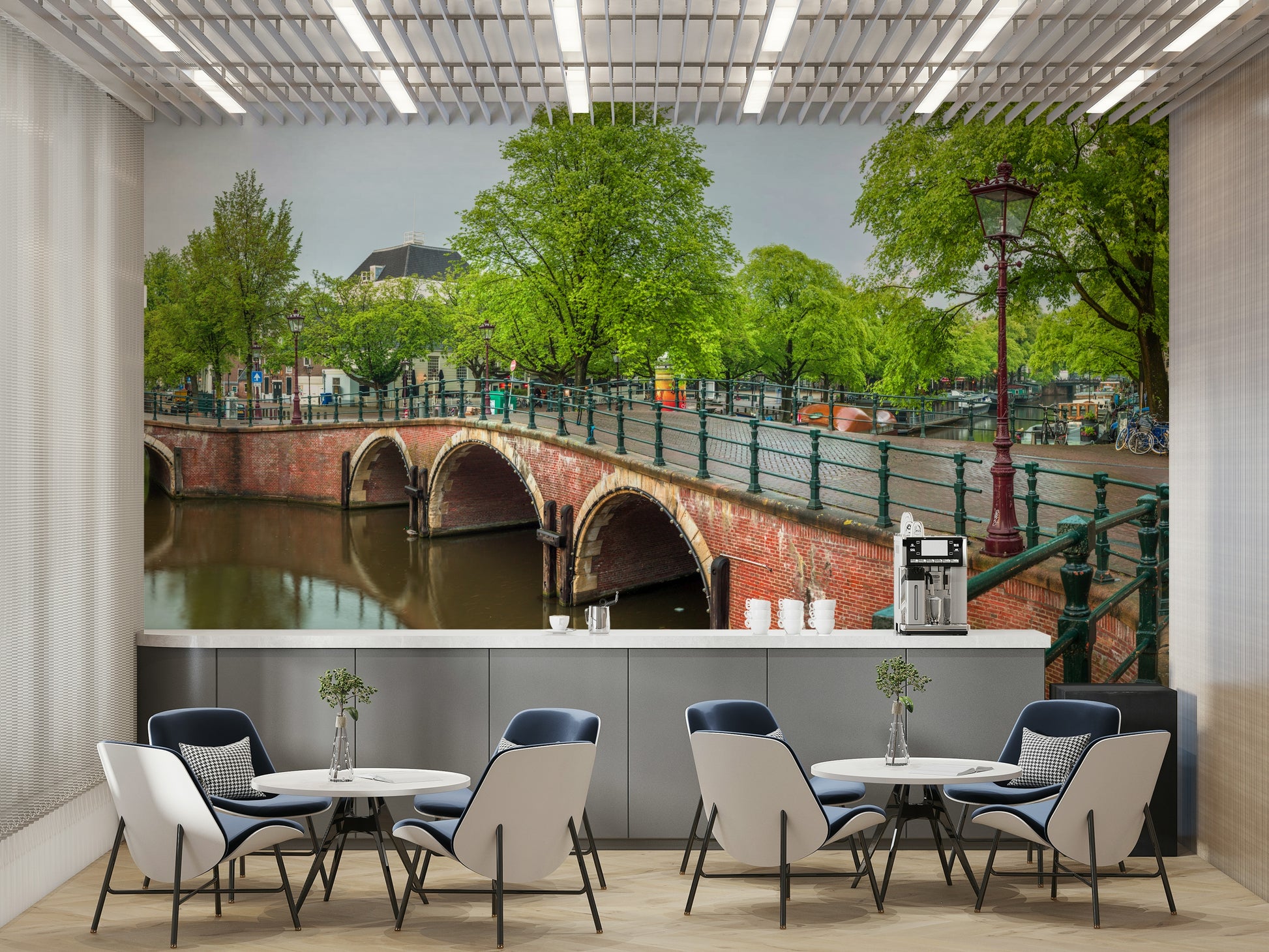 A close-up view shows the soft lines and details of the buildings and the water.

