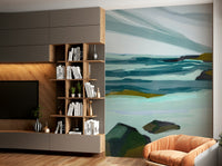 A close-up view shows the soft lines and details of the waves and the shore.

