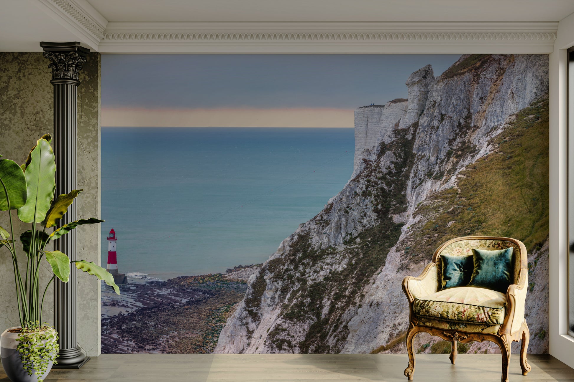 A close-up view shows the soft lines and details of the cliffs and the waves.

