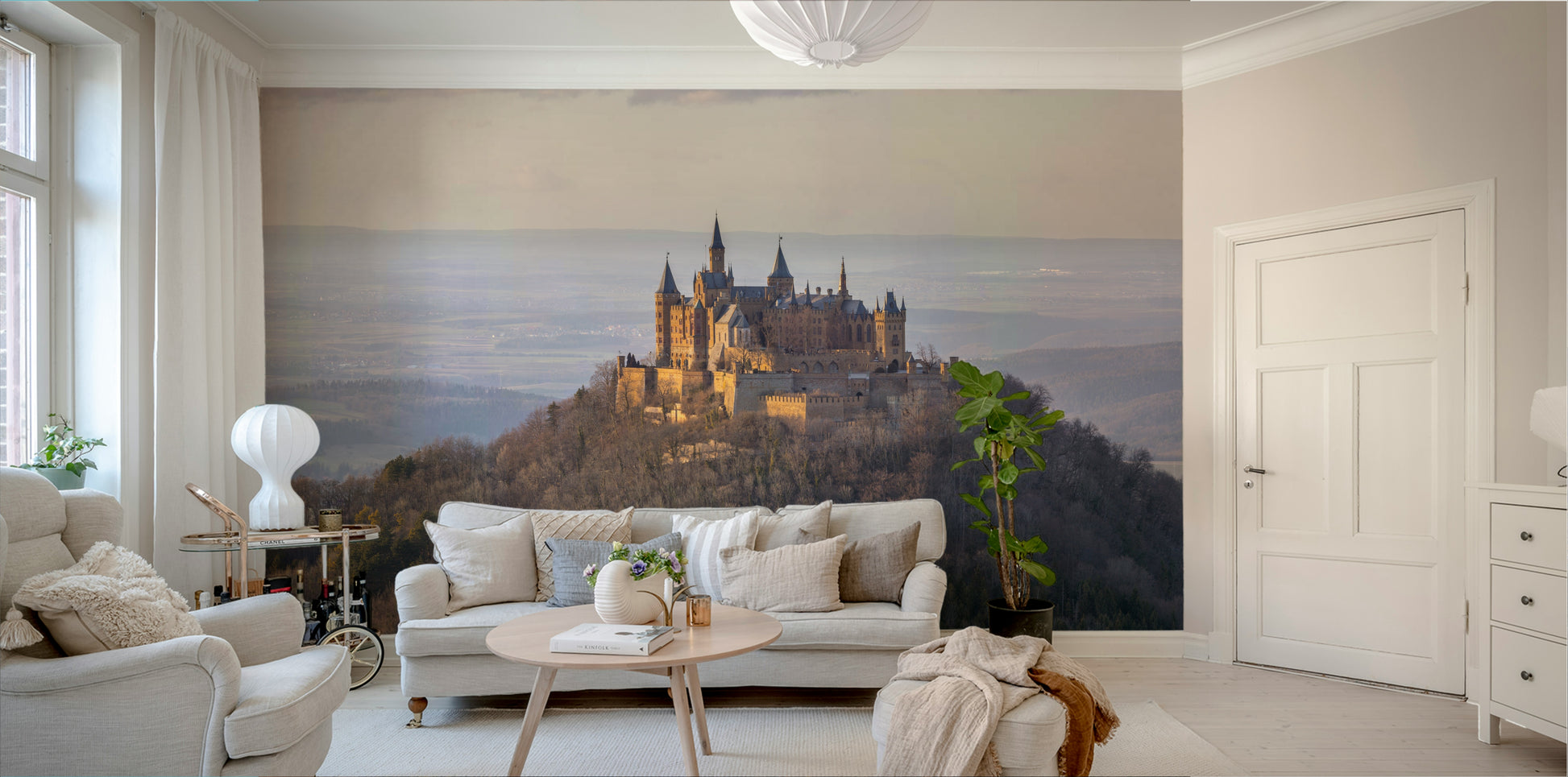 The lighting in the room is warm, complementing the mural's colors.
