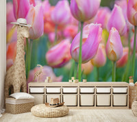 The mural shows a peaceful scene with trees, flowers, and a stream.

