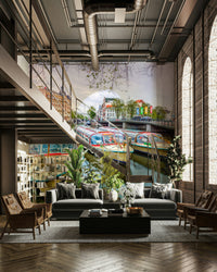 The mural shows a peaceful street scene with a canal and historic buildings.

