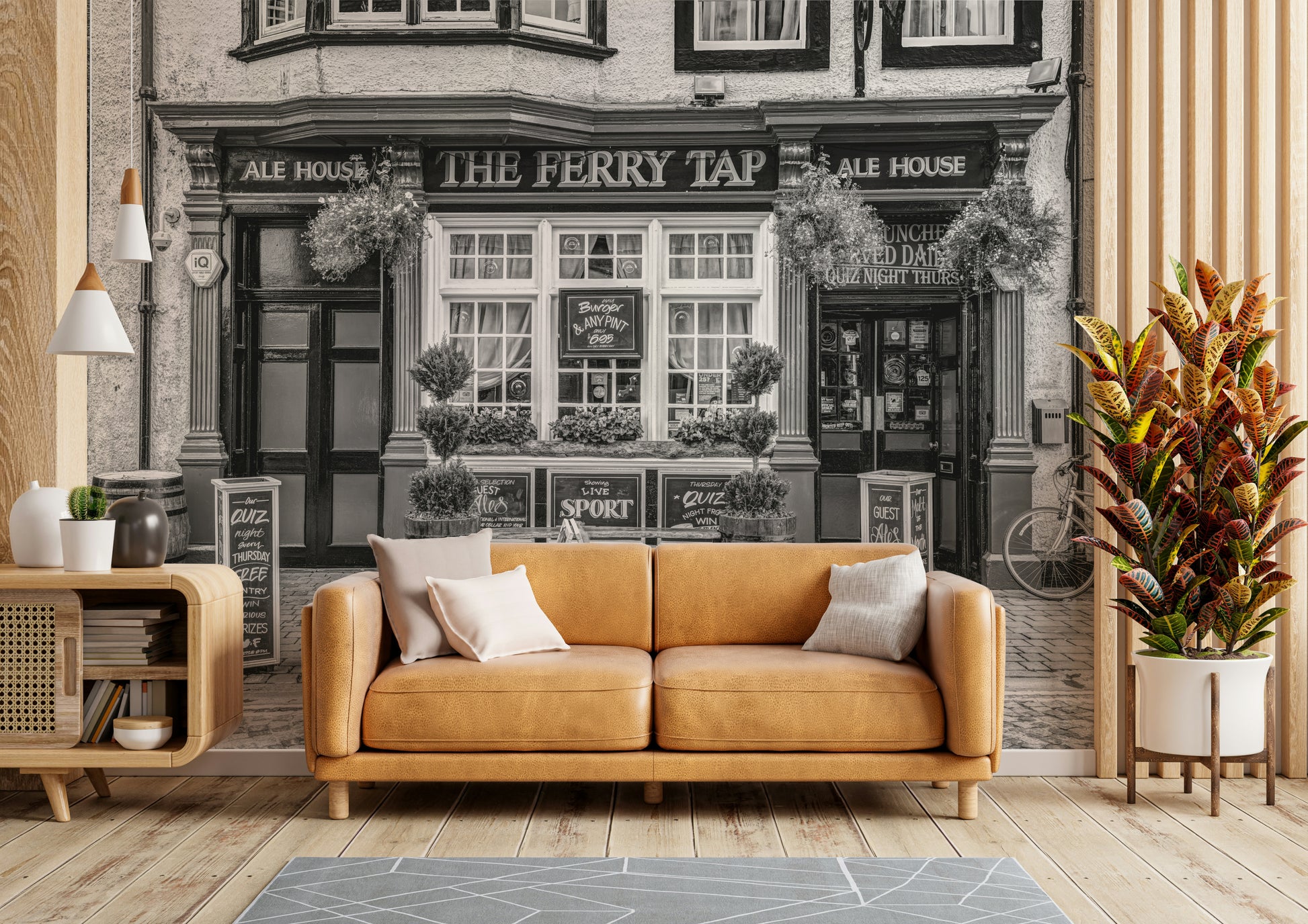 The mural shows a peaceful street scene with a view of the Forth Bridges.

