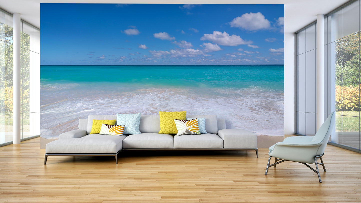 A close-up of the delicate waves and sand.

