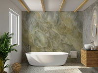 Wall mural with a luminous stone texture.

