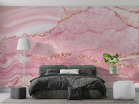 A close-up of the delicate pink and gold texture.

