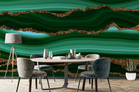 The wall art combines a flowing pattern with metallic accents.

