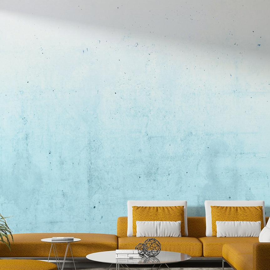 The wallpaper shows a gradient from teal to gray.

