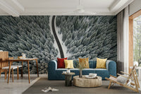 A wall covering depicting a serene winter scene.

