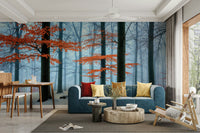 The trees are covered in leaves of various warm colors, like orange, yellow, and red.
