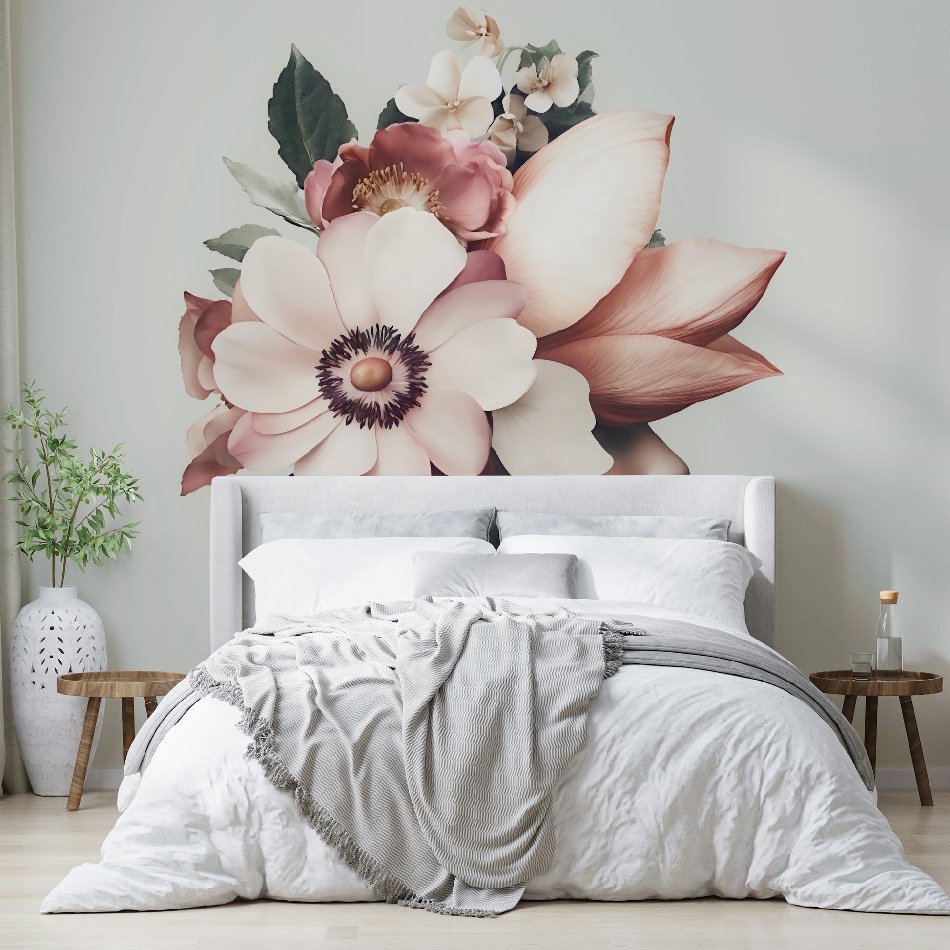 The flowers are in soft, pale blush pink and cream colors.
