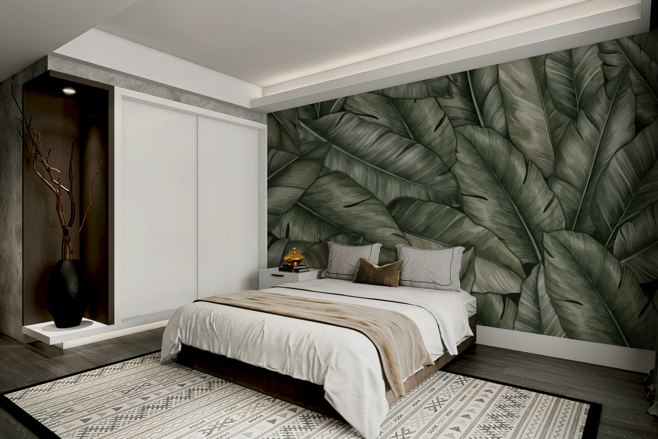 A peaceful wall mural with a tranquil scene of lush leaves.

